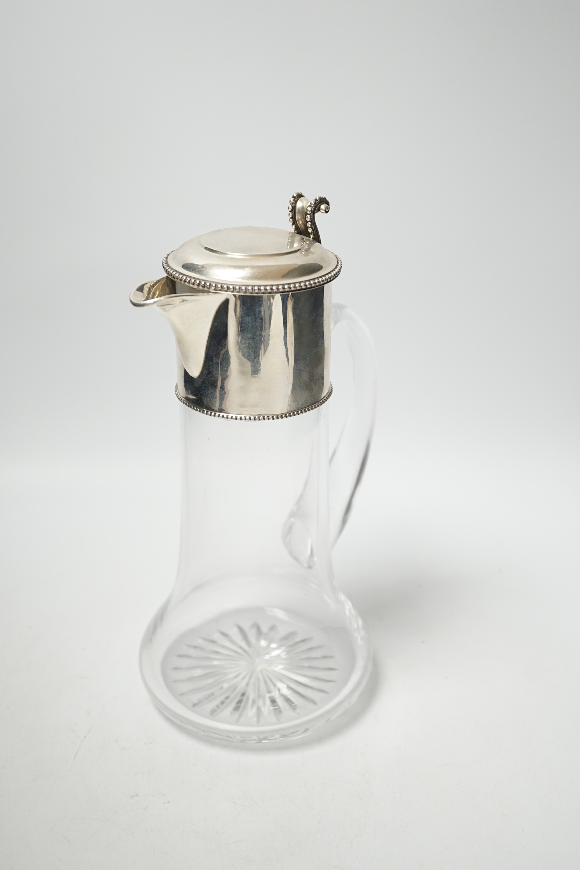 A Victorian silver mounted glass claret jug, John Wilmin Figg, London, 1868, 26.7cm.